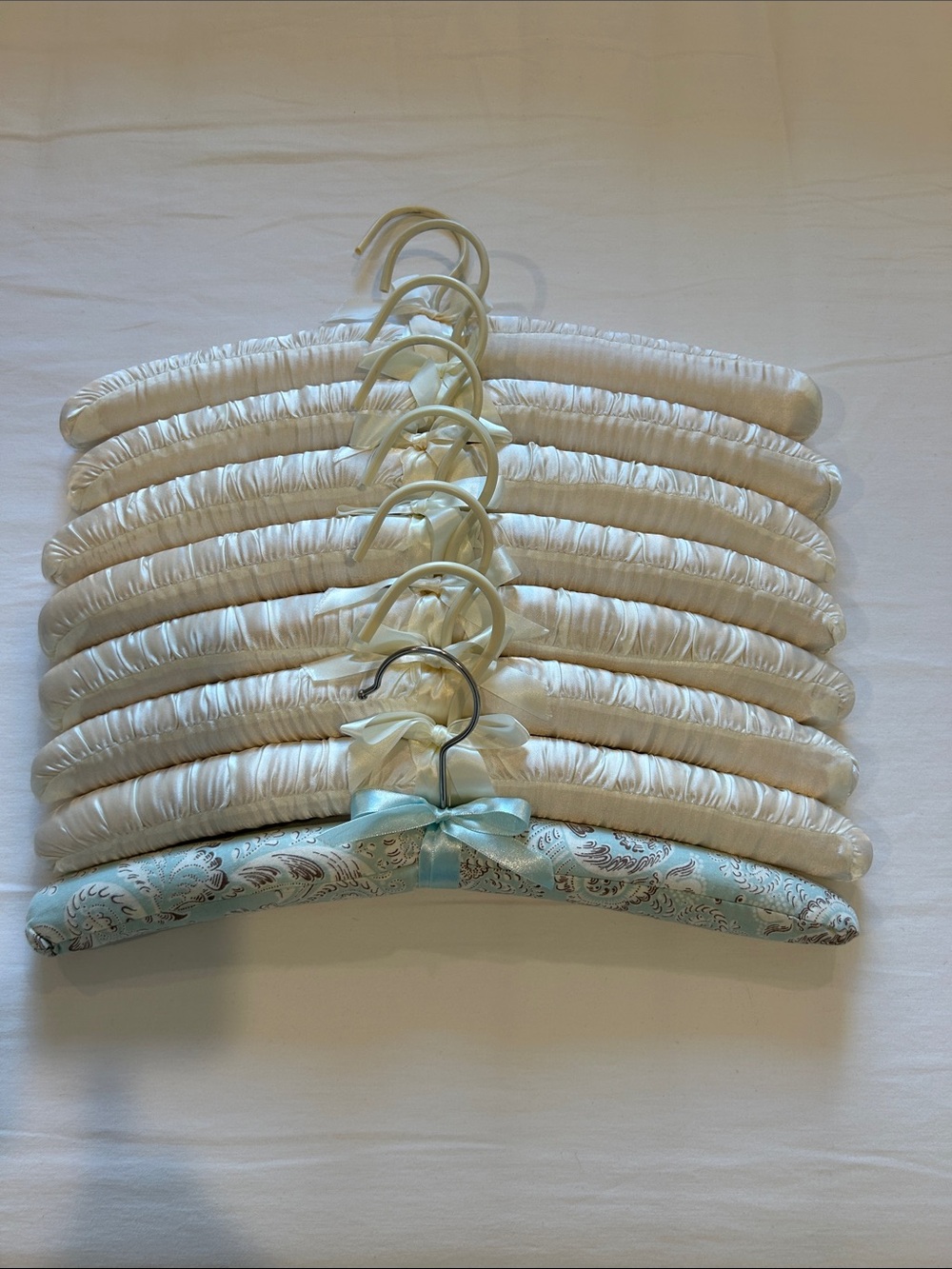Set of 8 Cream Satin Padded Hangers with one Blue Paisley one